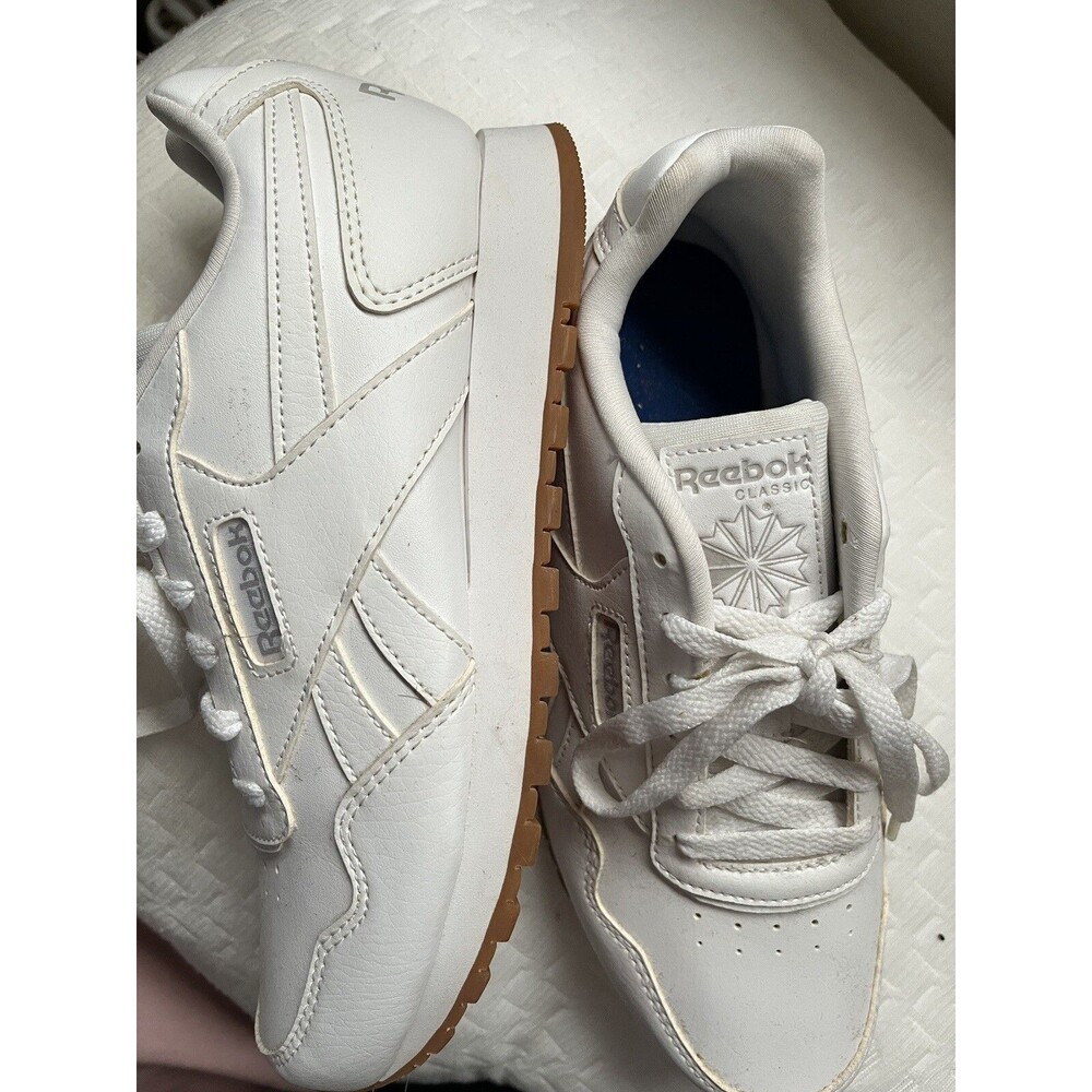 Clean nice white tennis shoes from Reebok